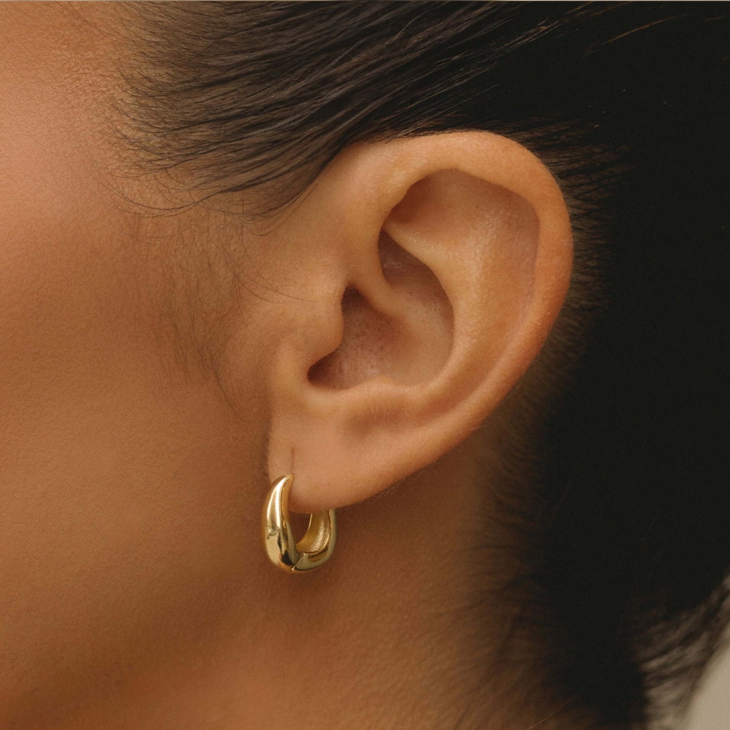 The Modern Sculptural Wavy Hoops